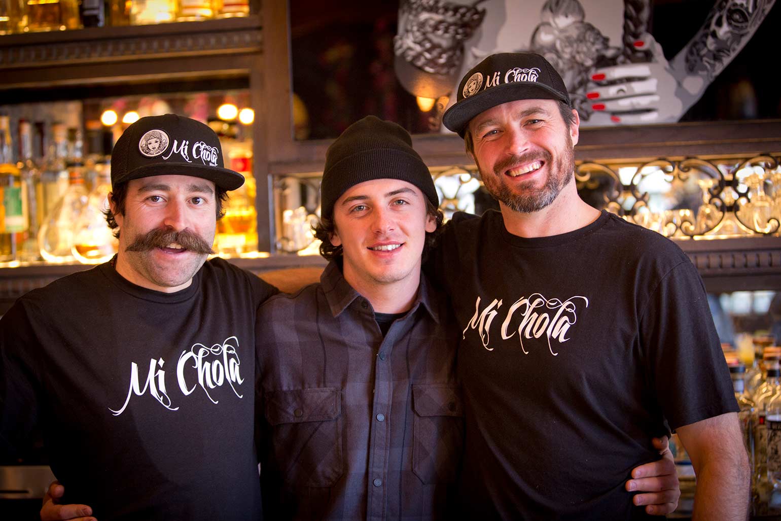 Mark McMorris poses with workers from Mi Chola in Aspen Colorado