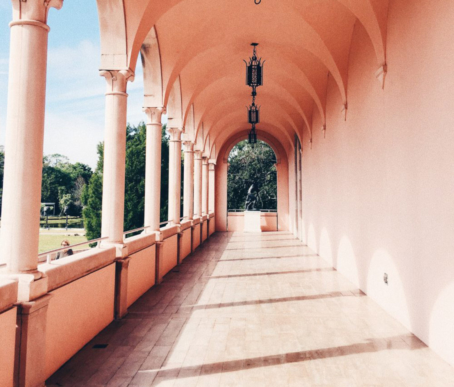 A peach archway located at the Ringling Museum of Art 