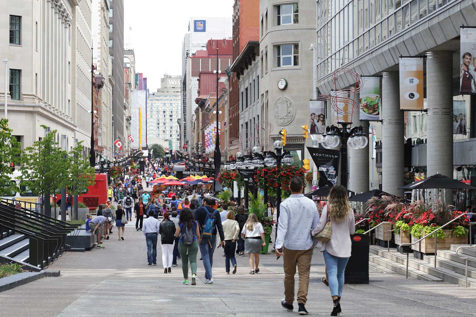 Sparks street mall in Ottawa is filled with visitors admiring the shops and establishments.