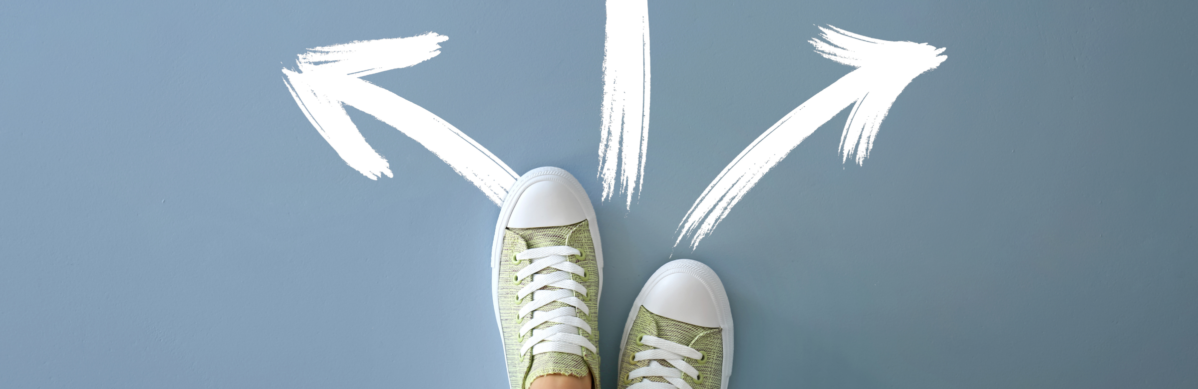 Woman standing on color background arrows