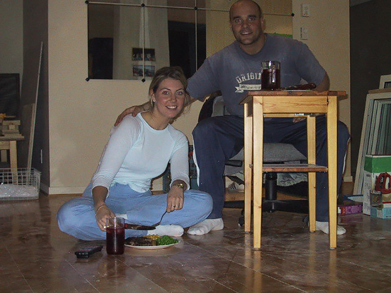 Bryan and Sarah eating in the house