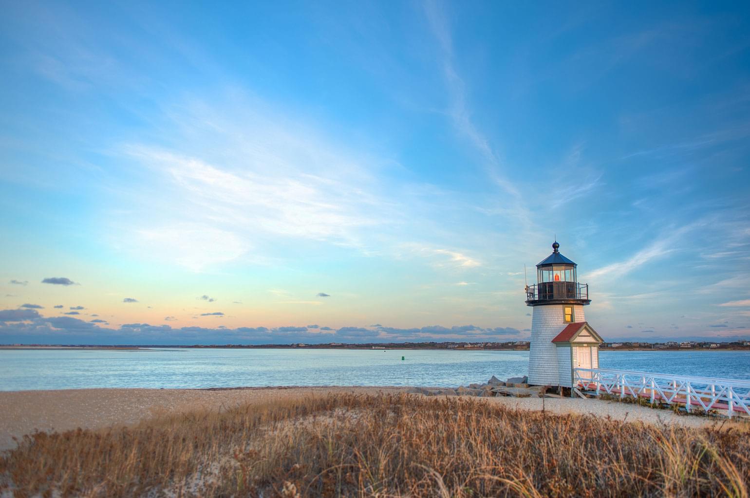 A traditional light house on the beach at Cape Cod, Massachusetts.