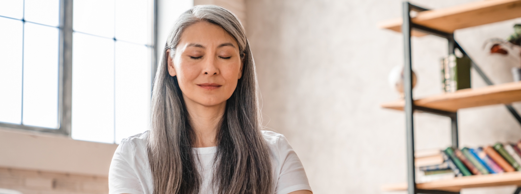 A woman mediating.