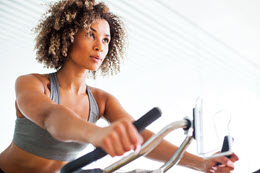 A woman using treadmill.