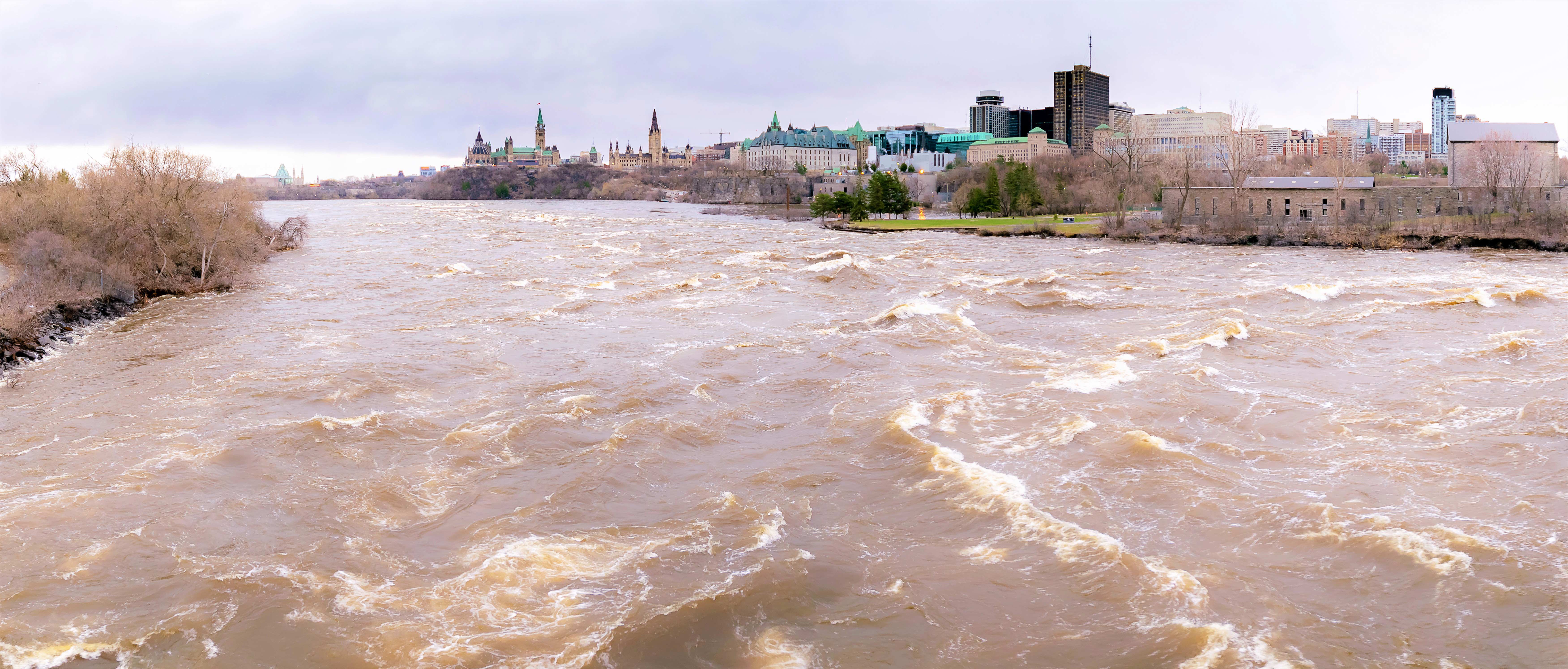 A panoramic view taken from the Portage Bridge in downtown Ottawa, showing flooding of the Ottawa River