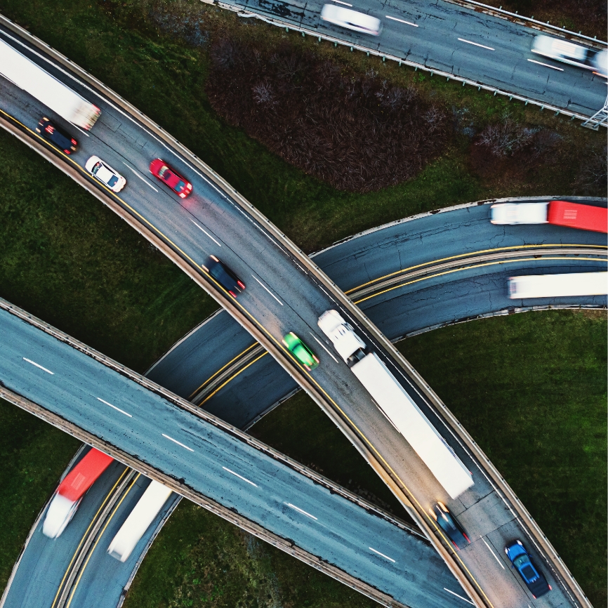 Trucks moving around on a highway