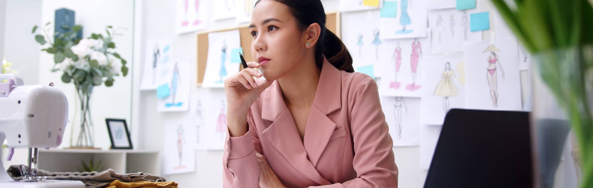 Woman working at a desk.