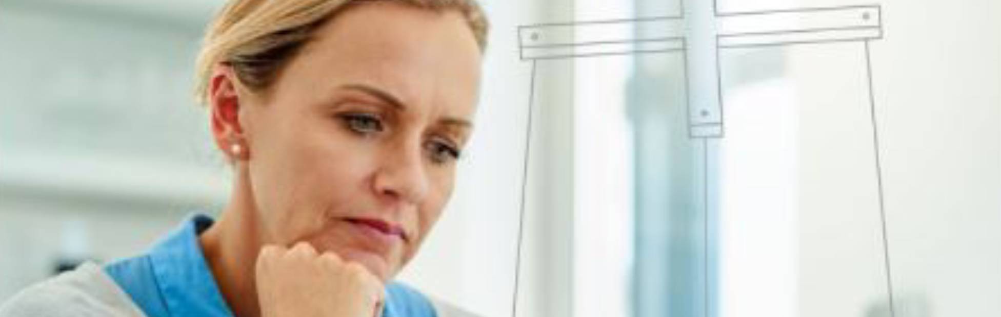 Lady leaning her head on her hand