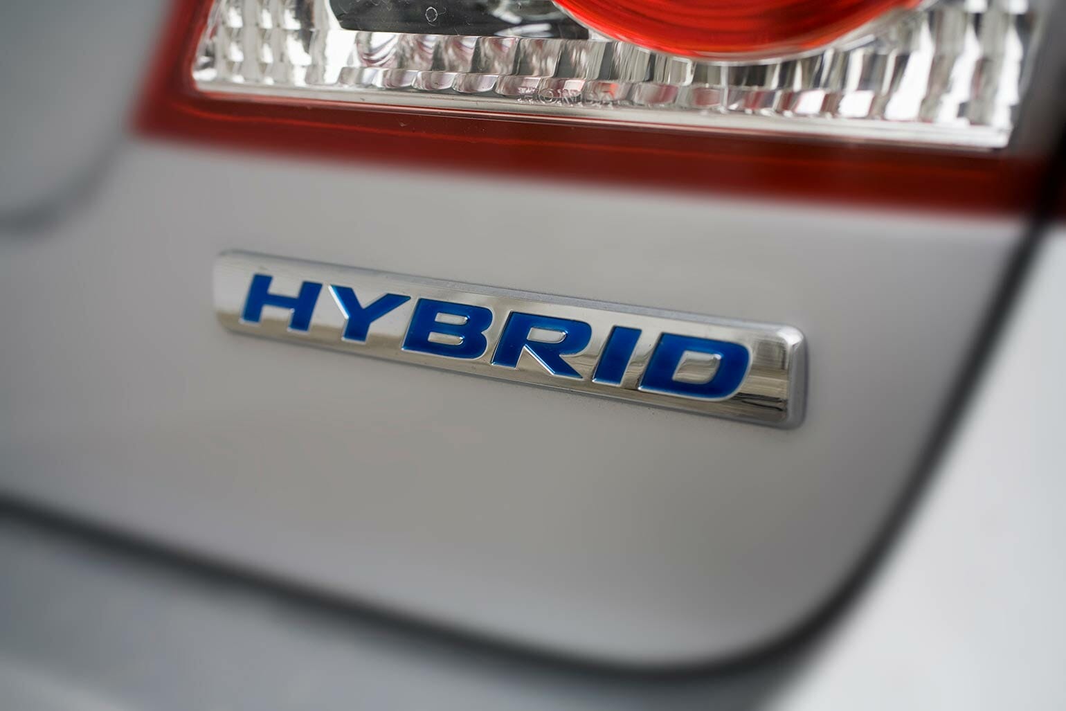 Hybrid side at the back side of a car
