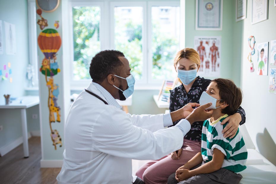 Close up of a family physician doing a check up on his patient