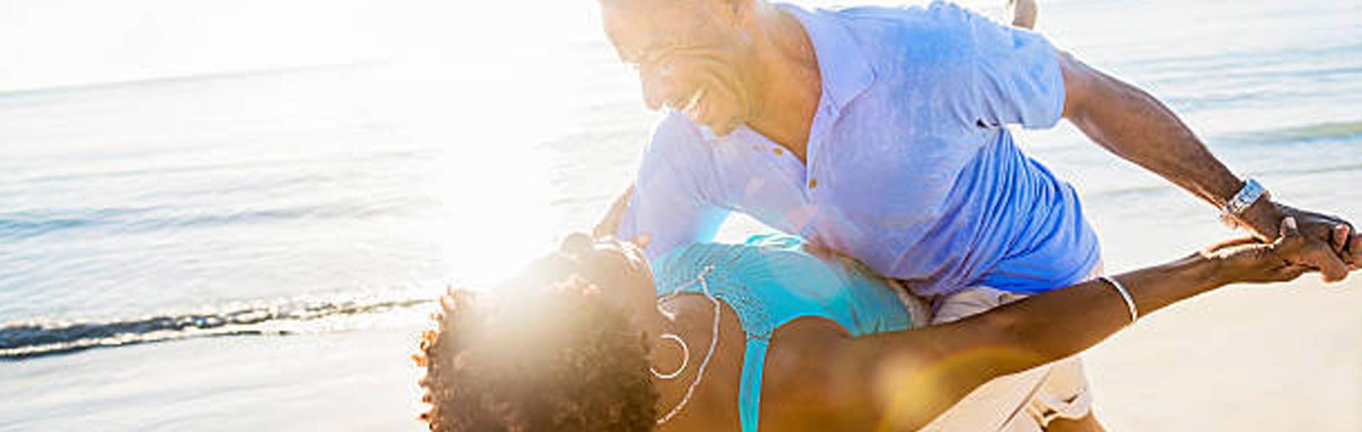 Couple dancing on beach