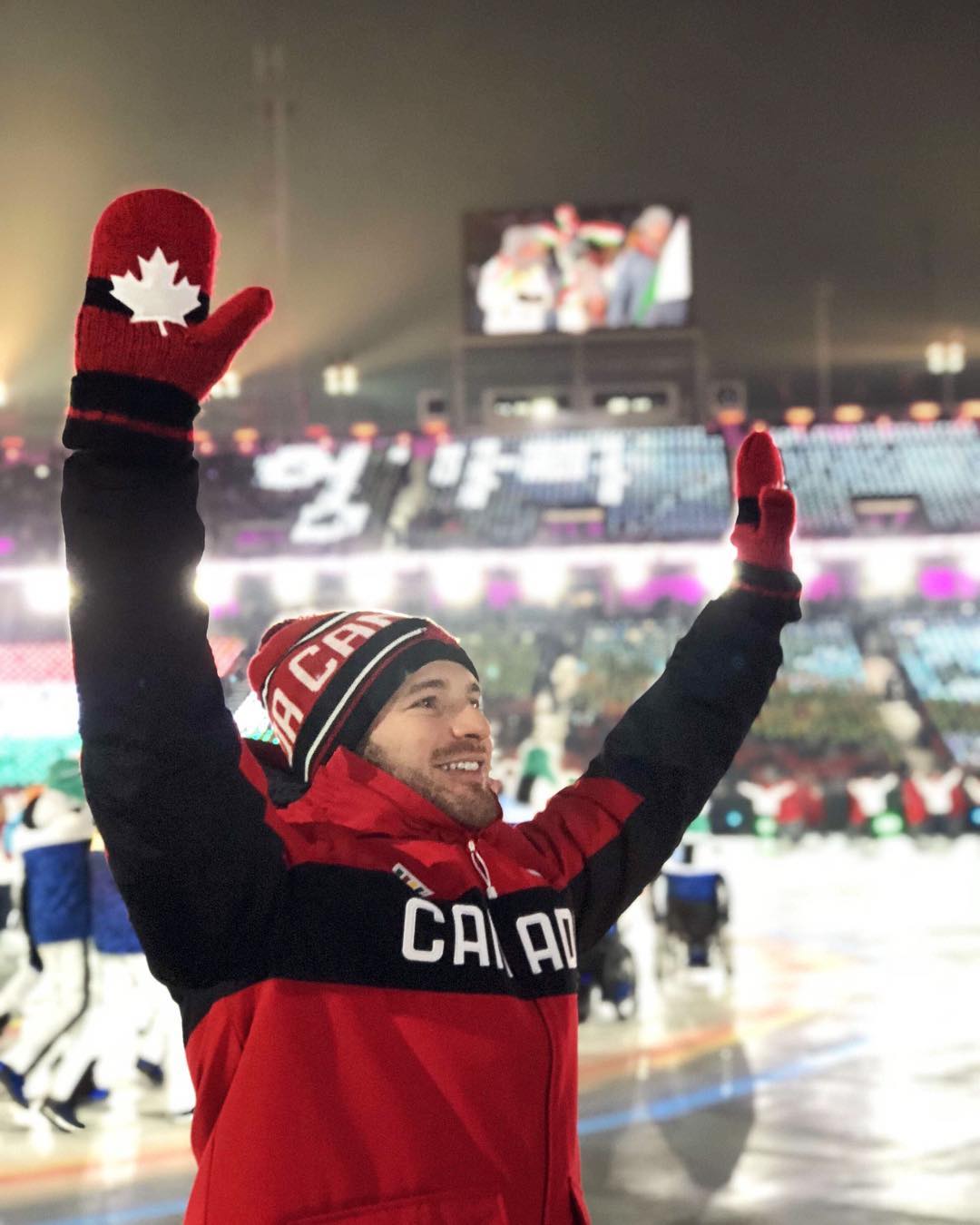 Tyler McGregor waving to fans at the paralympic games.