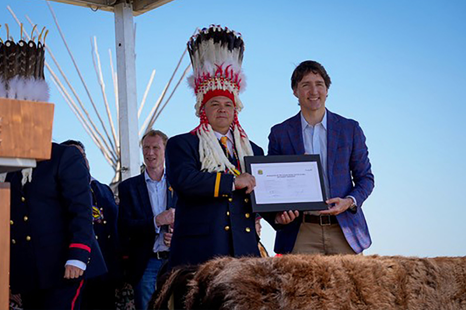Siksika's Settlement signed by Chief Ouray Crowfoot and Justin Trudeau