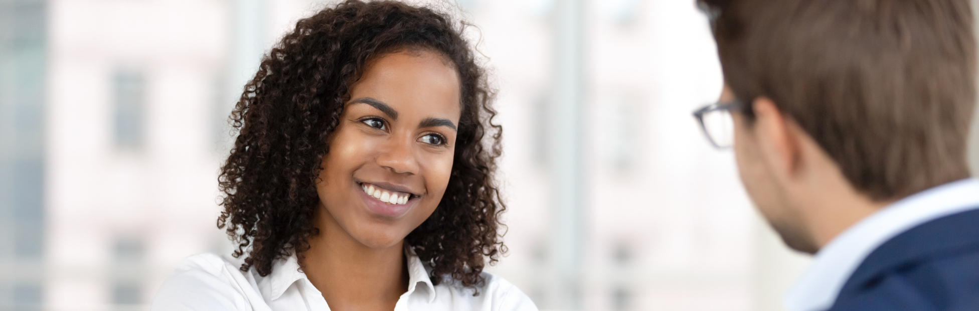 african female shaking hands with HR interviewer