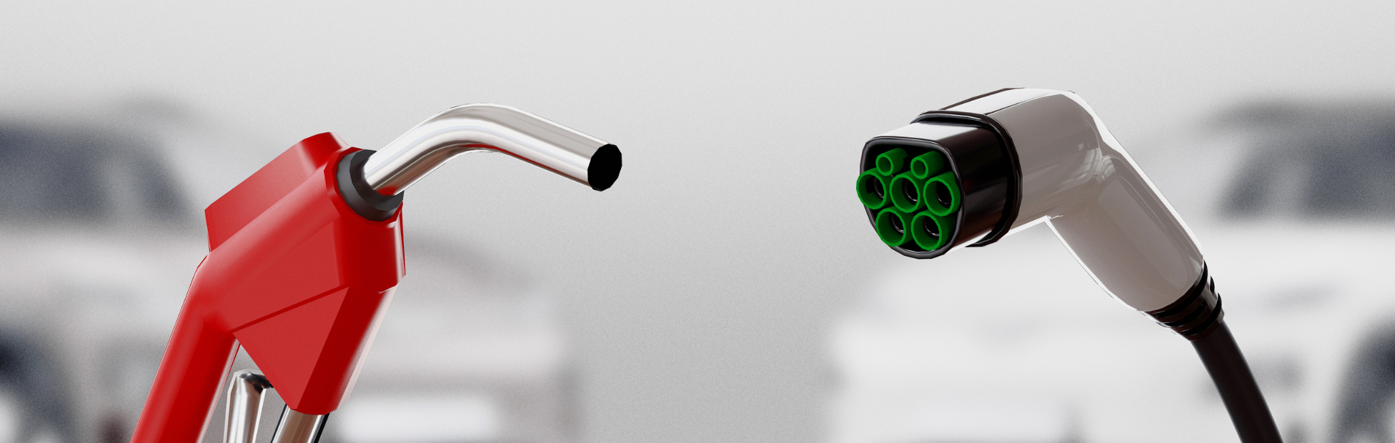 Red gas hose and a green electric charging hose