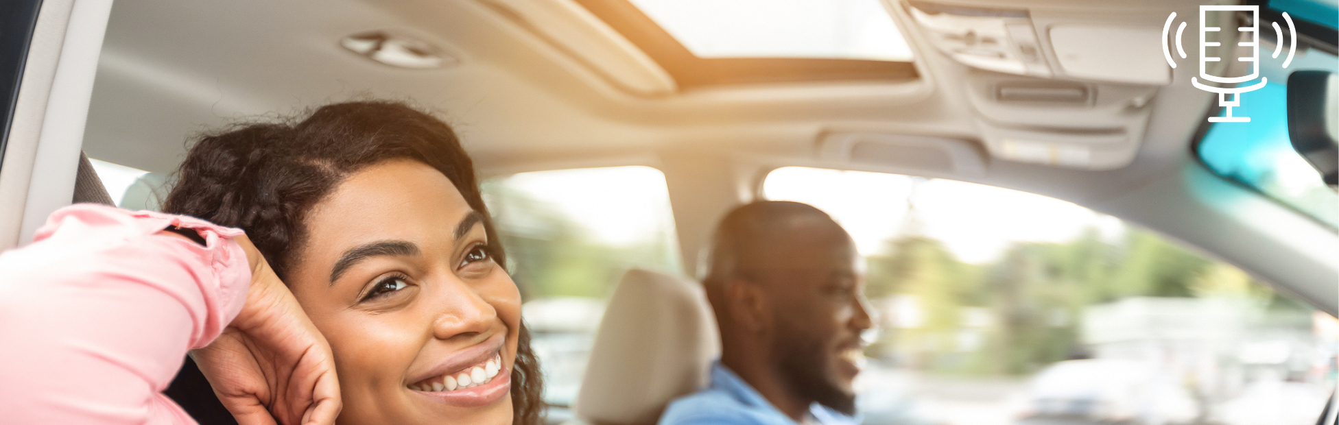 Lady smiling in the car