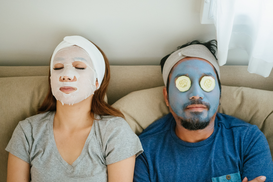 Man and woman with face masks