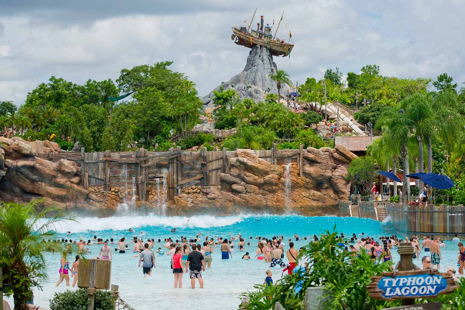 Guests splash around in the Typhoon Lagoon Surf Pool at Disney's Typhoon Lagoon Water Park.