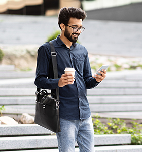 Man walking with his coffee