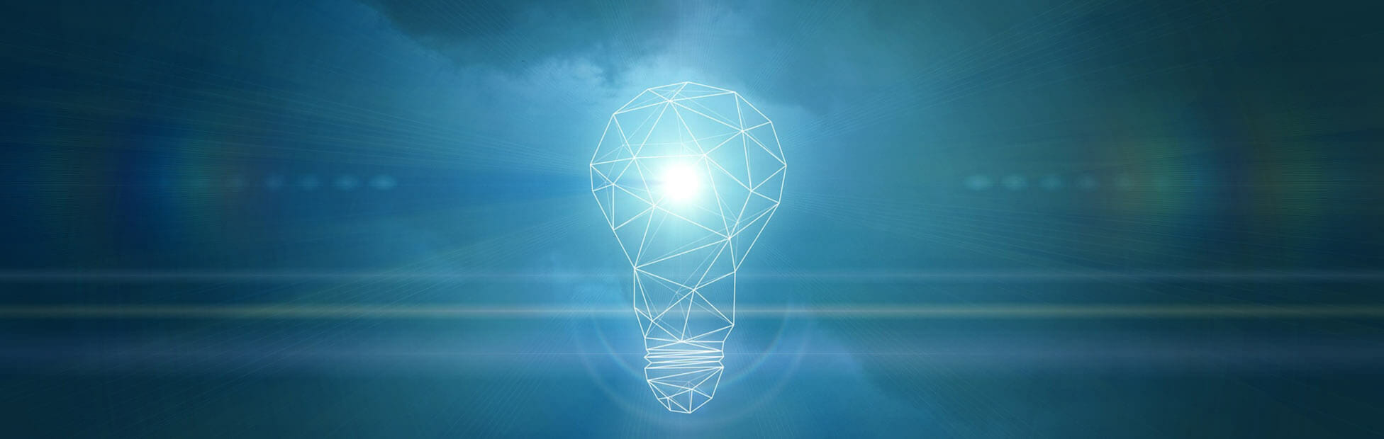 Black background with hand showing, holding a lit up light bulb - to represent a 